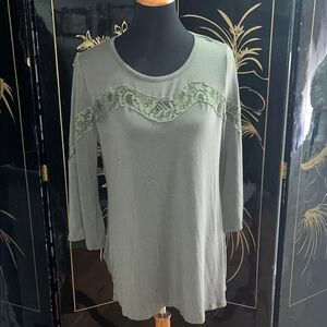 Ladies, long sleeve large top with lace detail across the front and sleeves
